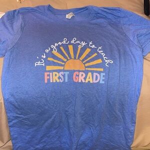 2 First Grade T-shirts
